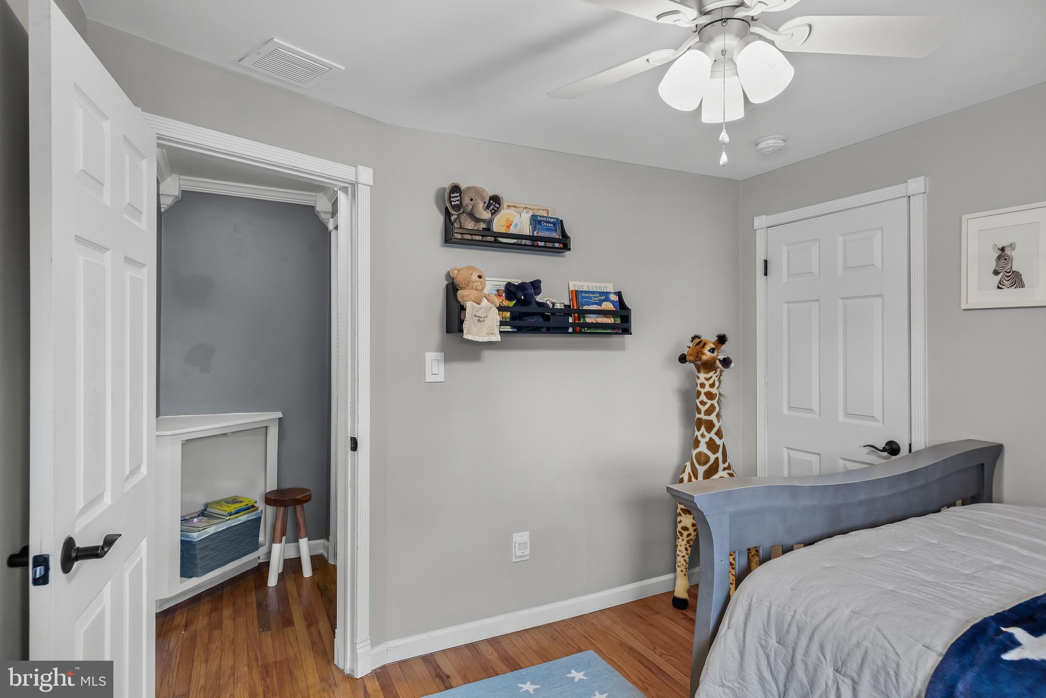 2407 Riverton Road Cinnaminson, NJ 08077 - Photo 34 of 54 a bedroom with bed and wooden floor