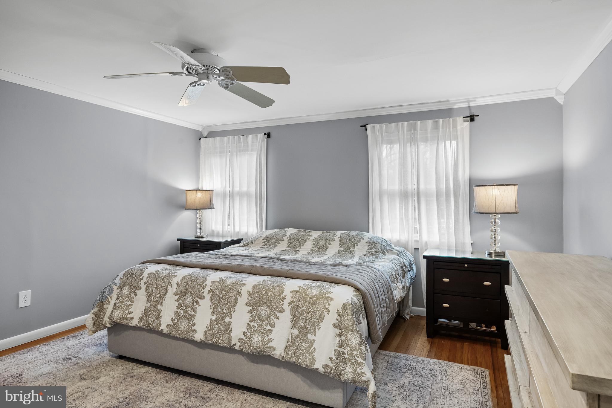 2407 Riverton Road Cinnaminson, NJ 08077 - Photo 35 of 54 a bedroom with a bed and a night stand