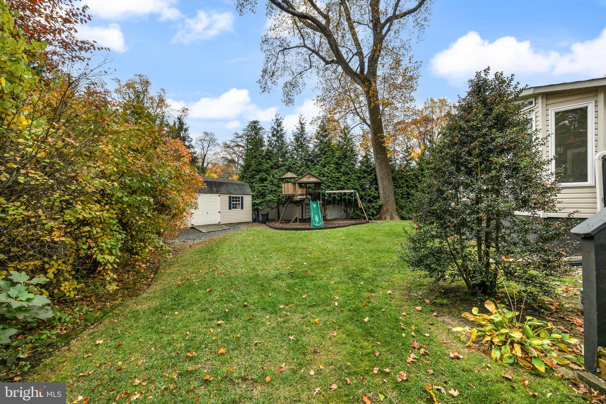 2407 Riverton Road Cinnaminson, NJ 08077 - Photo 49 of 54 a view of a house with a yard