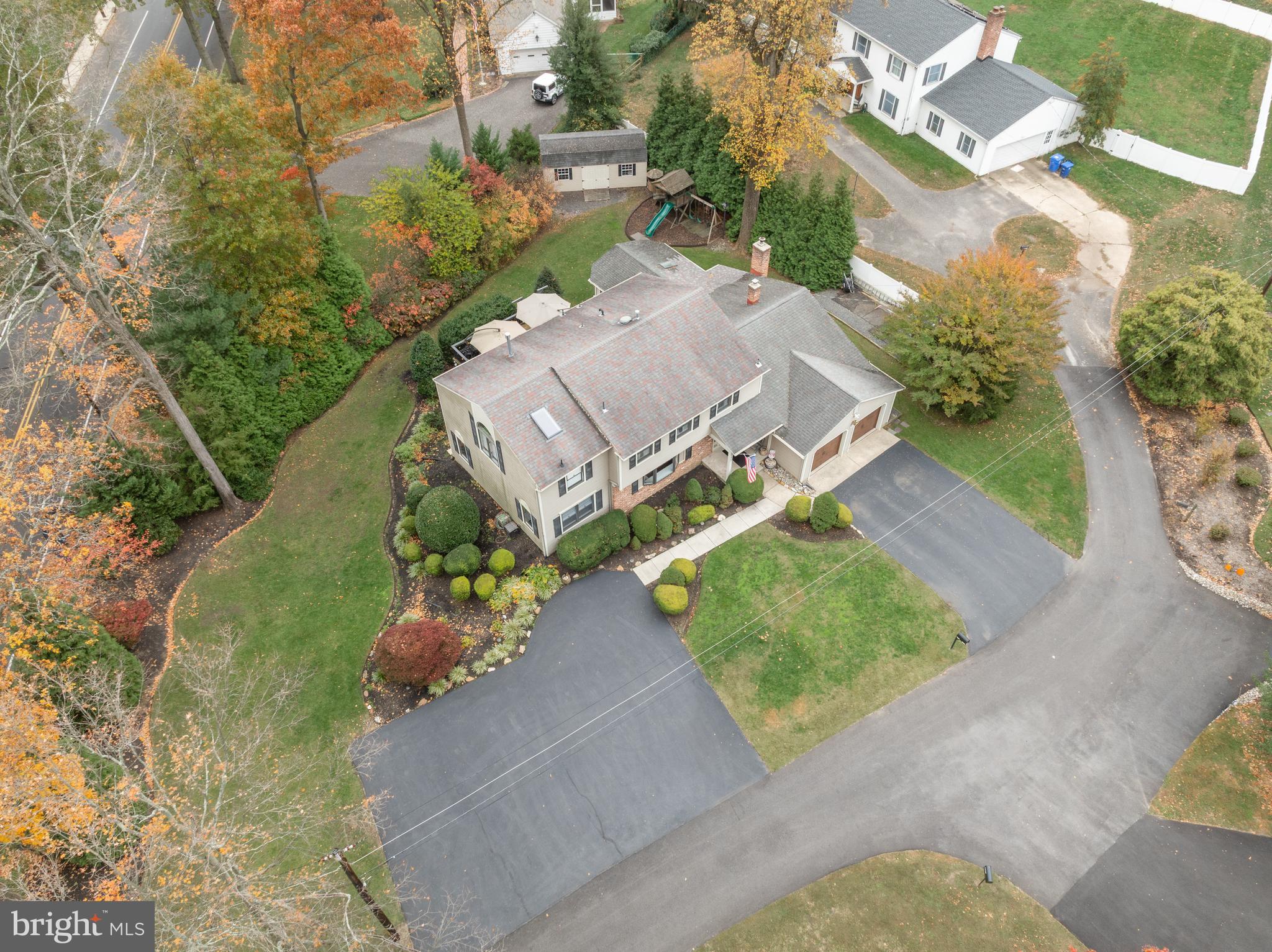2407 Riverton Road Cinnaminson, NJ 08077 - Photo 50 of 54 an aerial view of a house with a yard and garden