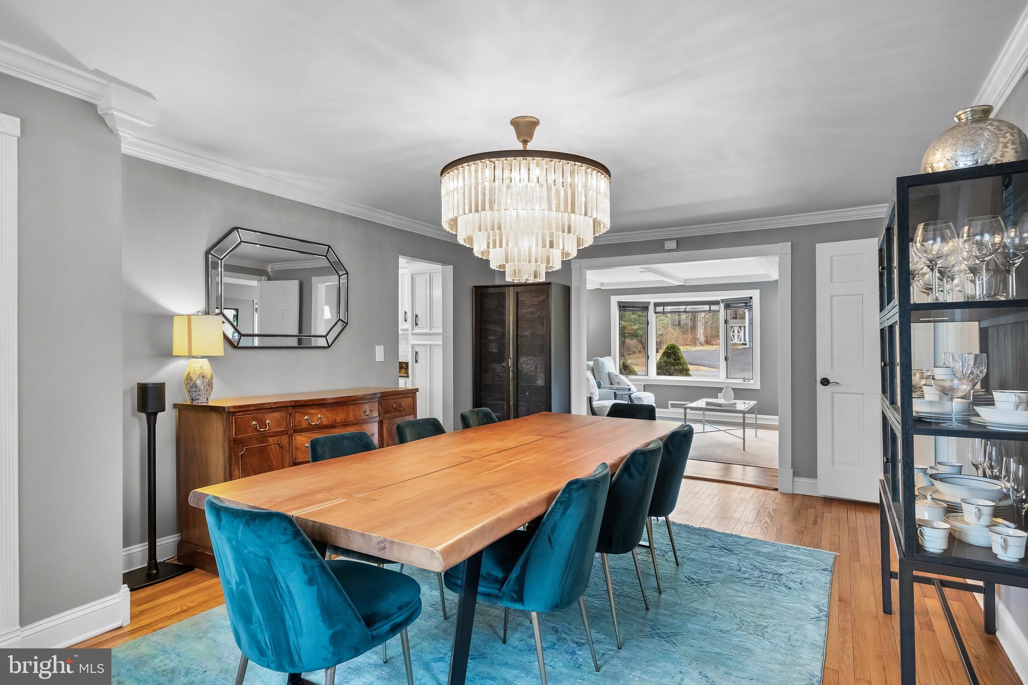 2407 Riverton Road Cinnaminson, NJ 08077 - Photo 10 of 54 a dining room with a table chairs and kitchen view