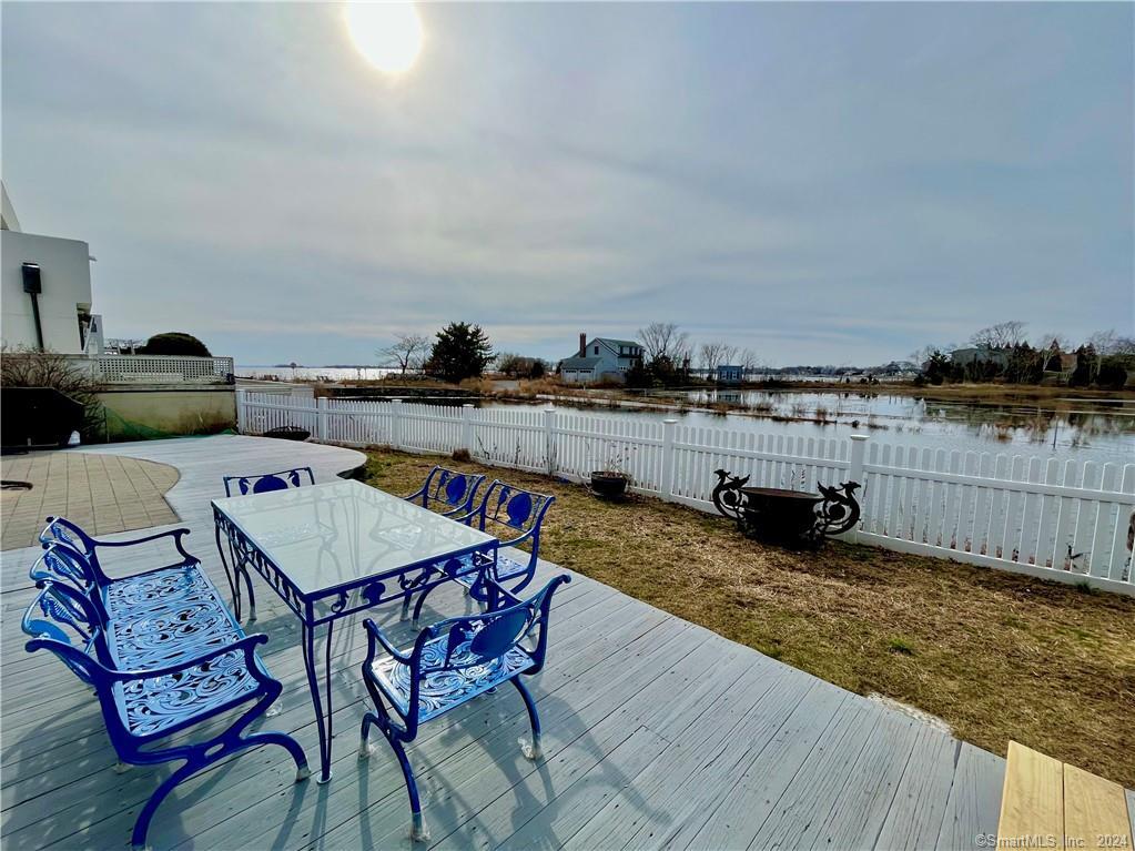 a view of a terrace with sitting area