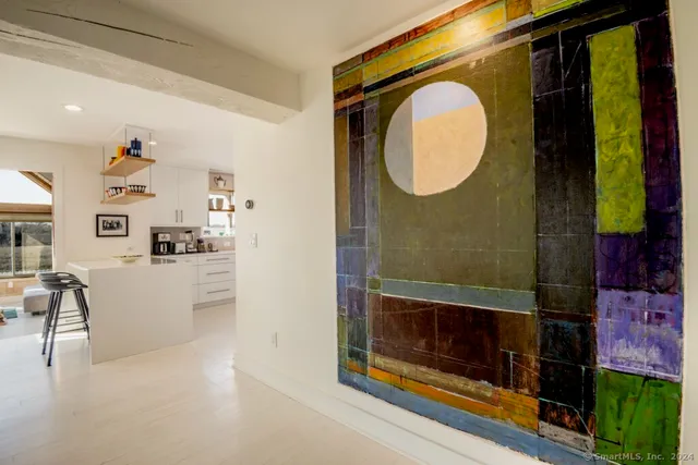 a view of a living room and bathroom