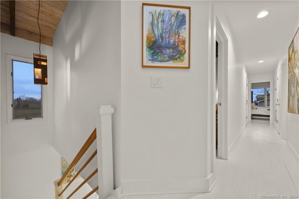 36 Spriteview Avenue Westport, CT 06880 - Photo 14 of 33 a view of a hallway with wooden floor and entryway