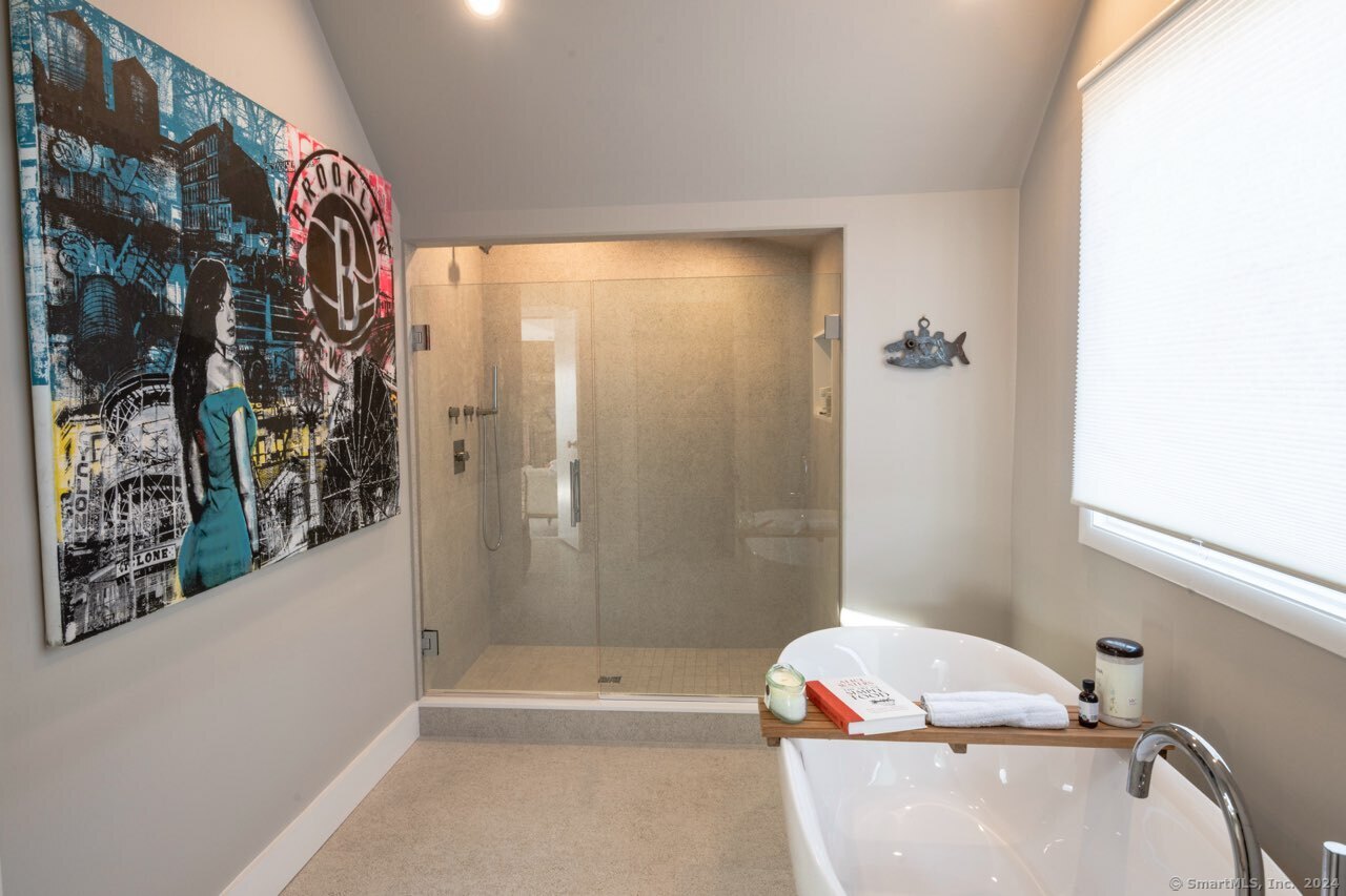 36 Spriteview Avenue Westport, CT 06880 - Photo 19 of 33 a bathroom with a bathtub and shower