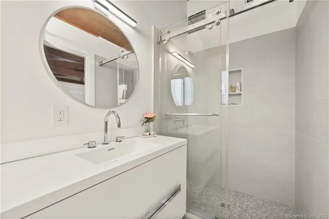 a utility room with a sink dryer and washer