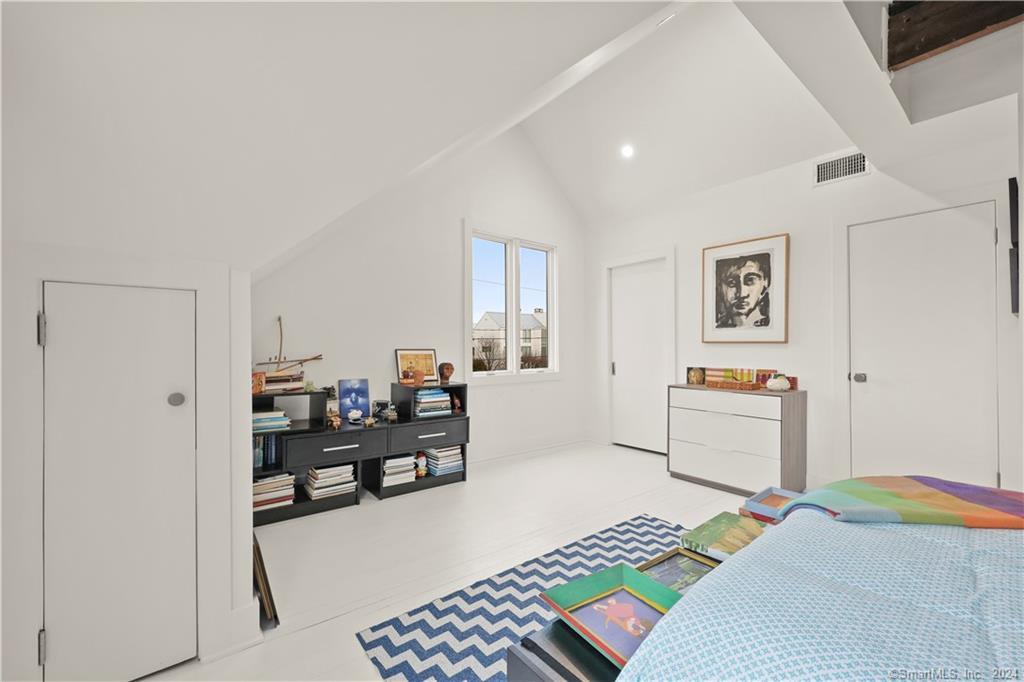 36 Spriteview Avenue Westport, CT 06880 - Photo 27 of 33 a bedroom with furniture and a window