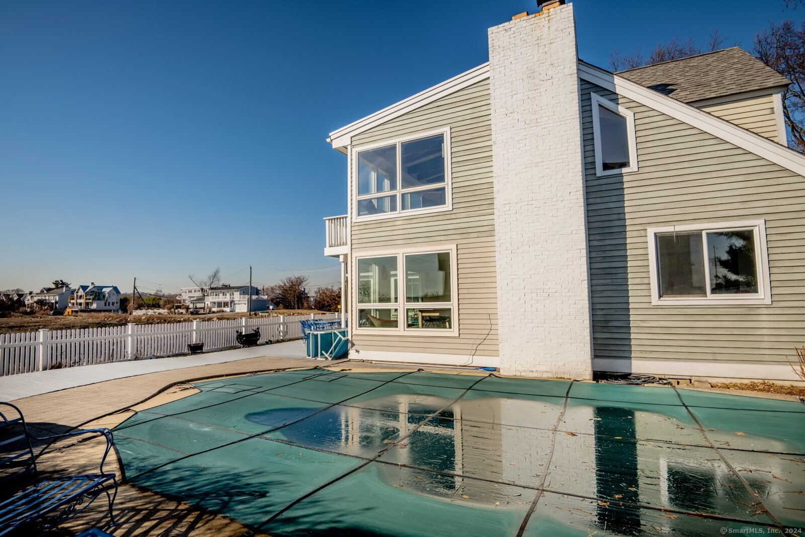 36 Spriteview Avenue Westport, CT 06880 - Photo 29 of 33 a view of a house with a lounge chairs