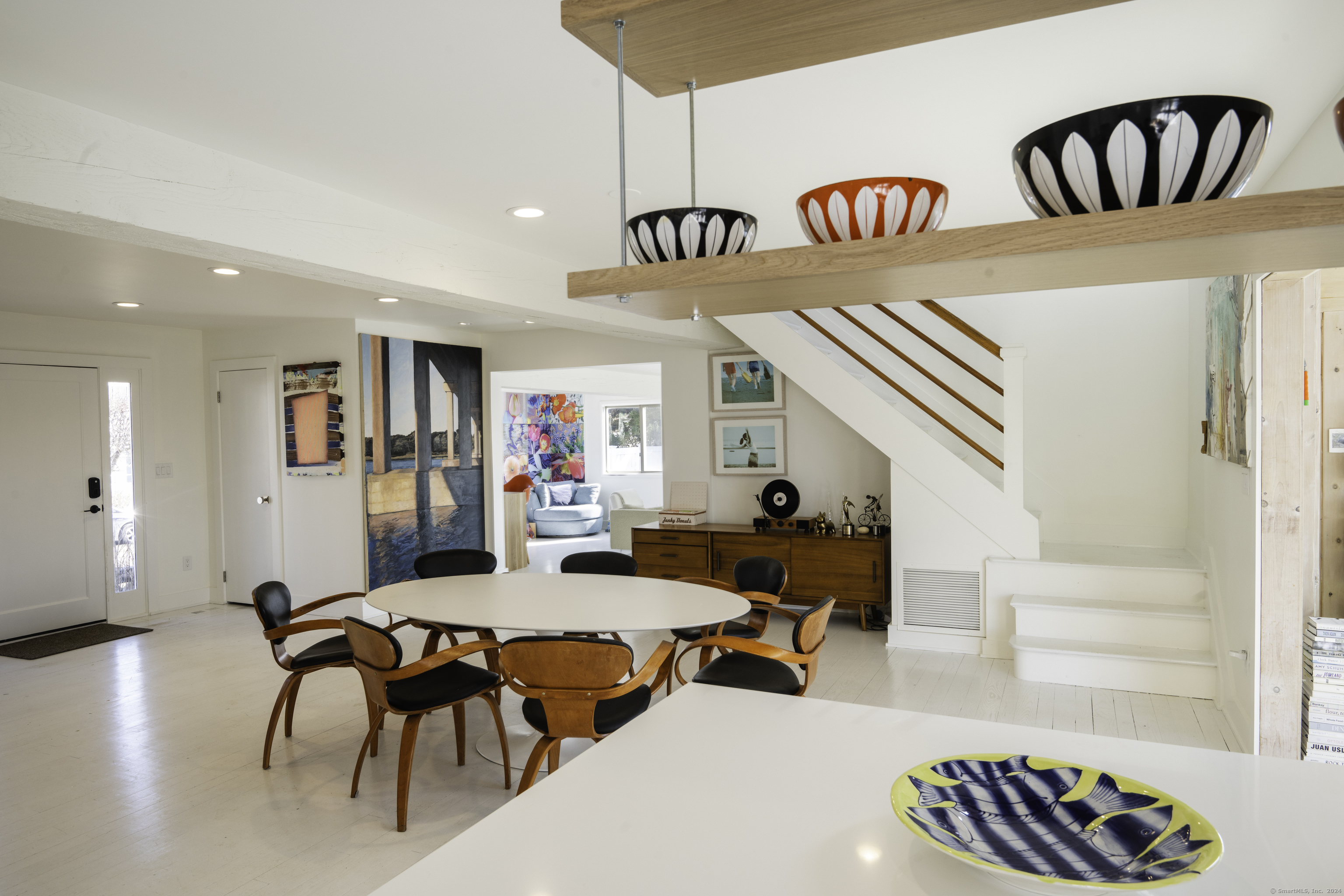 36 Spriteview Avenue Westport, CT 06880 - Photo 7 of 33 a outdoor living space with furniture and a book shelf