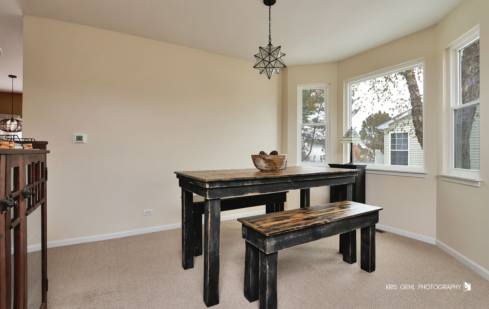 2726 Providence Lane Lindenhurst, IL 60046 - Photo 6 of 29 a view of a room with furniture window and wooden floor