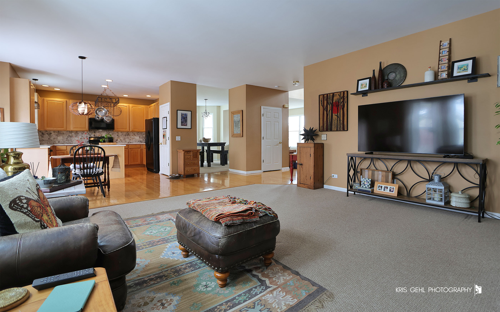 2726 Providence Lane Lindenhurst, IL 60046 - Photo 8 of 29 a living room with furniture and a flat screen tv