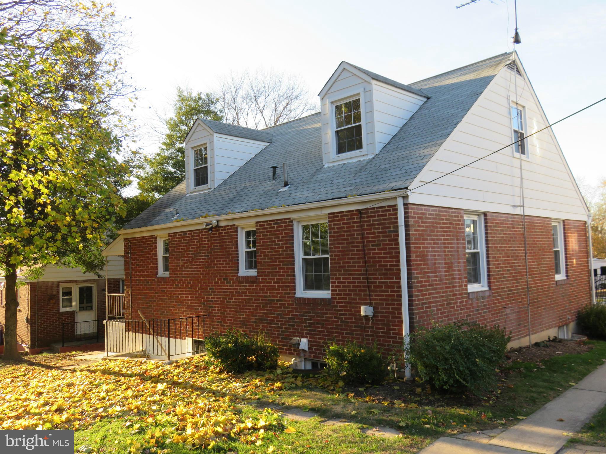 1747 Ellinwood Road Baltimore, MD 21237 - Photo 24 of 26 a front view of a house with yard