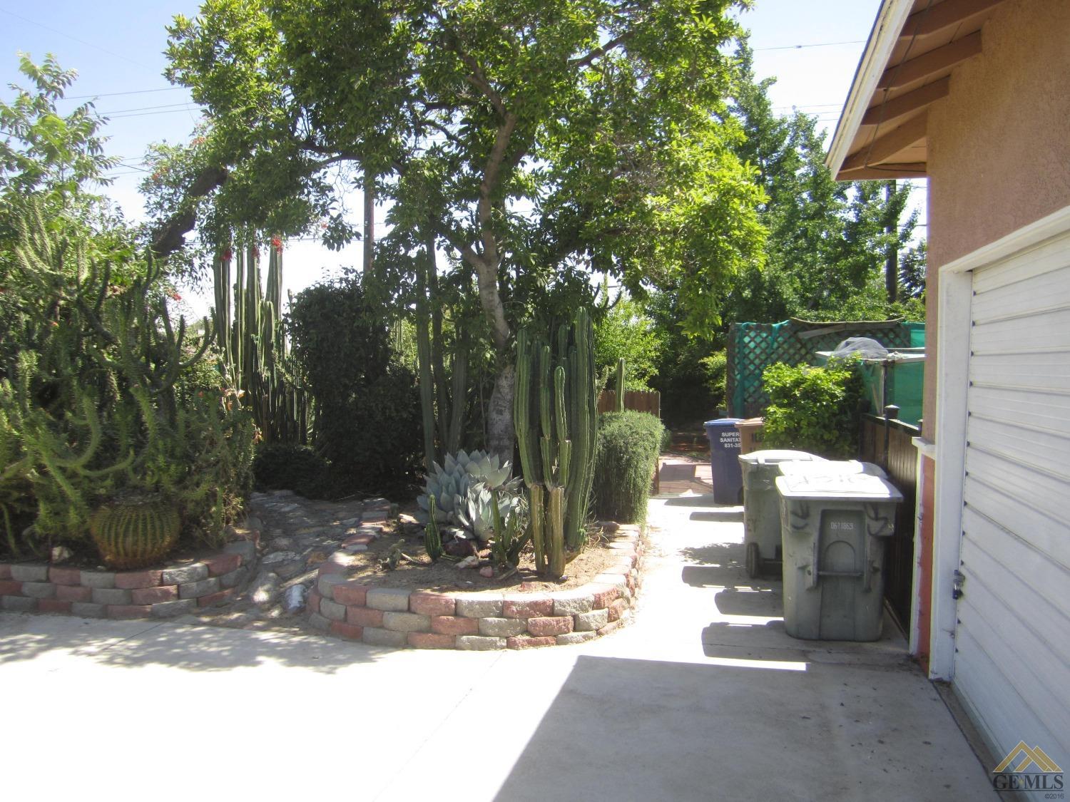 Undisclosed Address Bakersfield, CA 93305 - Photo 14 of 18 a view of backyard with tree
