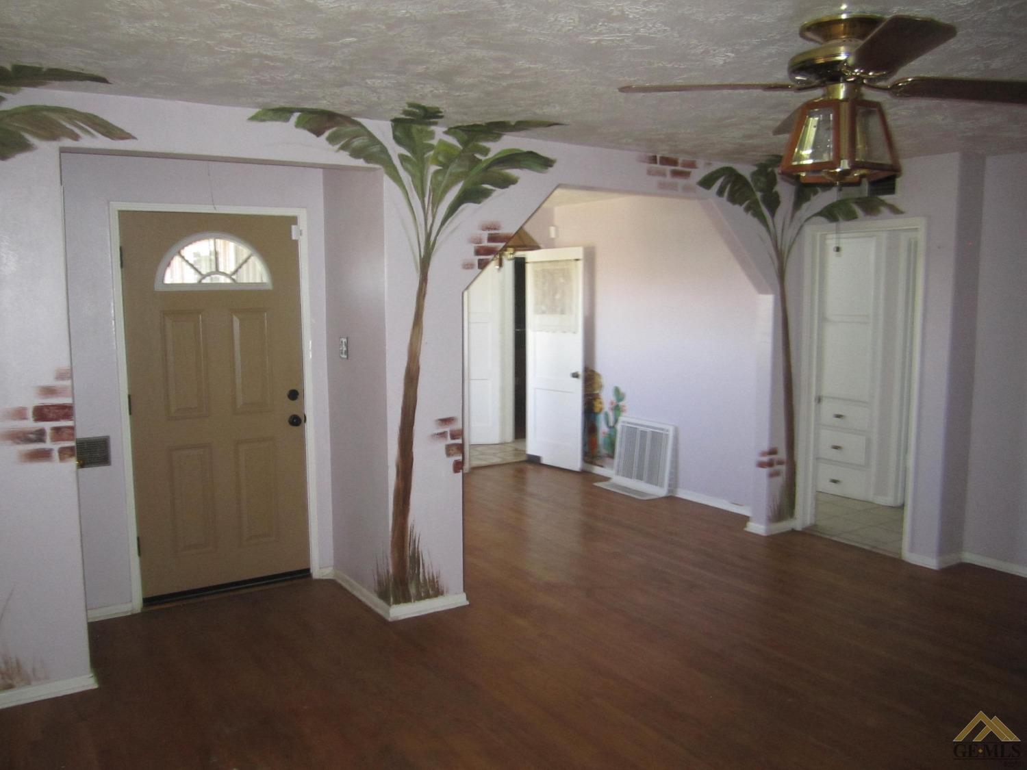 Undisclosed Address Bakersfield, CA 93305 - Photo 3 of 18 a view of a room with a hallway