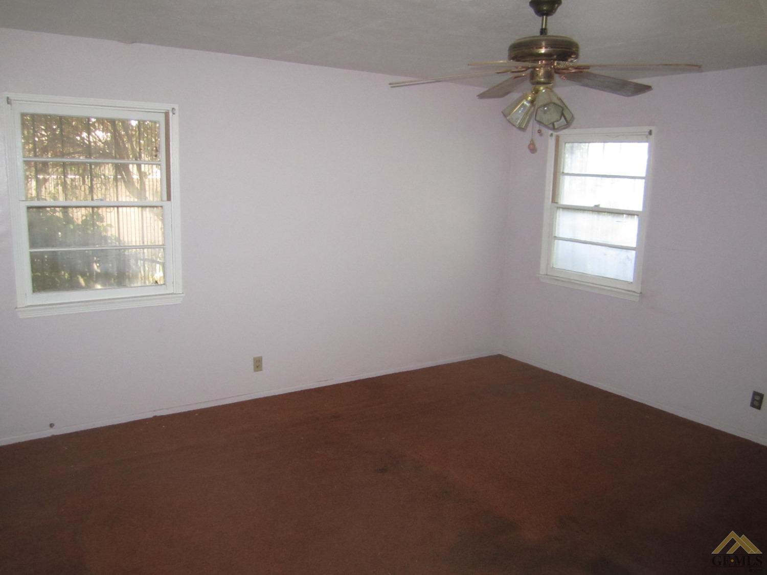 Undisclosed Address Bakersfield, CA 93305 - Photo 6 of 18 an empty room with a window