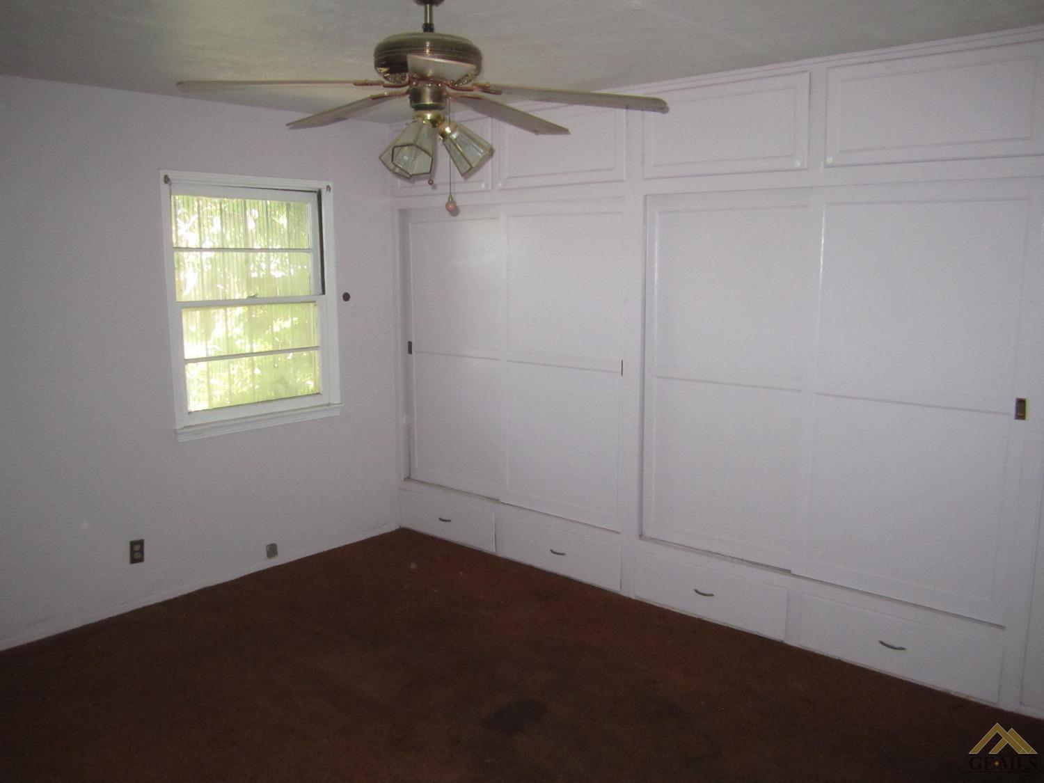 Undisclosed Address Bakersfield, CA 93305 - Photo 8 of 18 a view of a window in an empty room