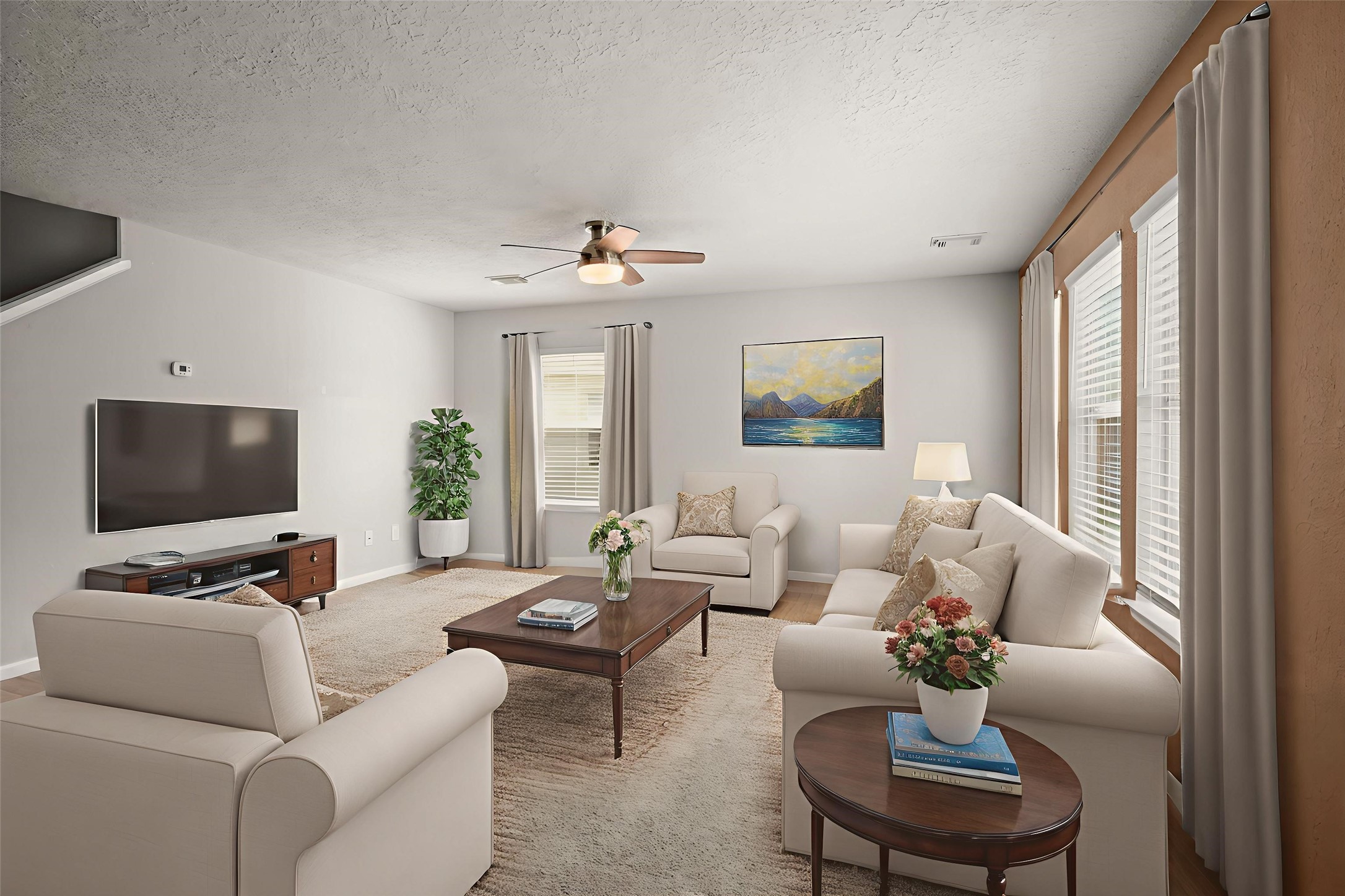 19819 Rippling Brook Lane Tomball, TX 77375 - Photo 7 of 28 Large family room allows for oversized furniture and multiple ways to arrange your large pieces. You'll find recent ceiling fans in the family room, game room and all bedrooms.