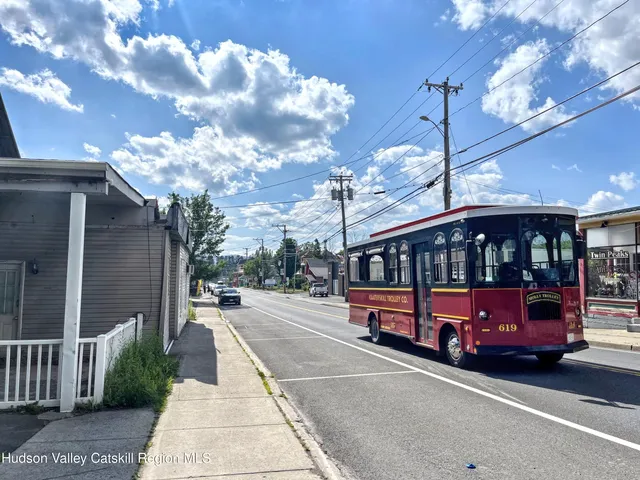 an aerial view of a house with outdoor space