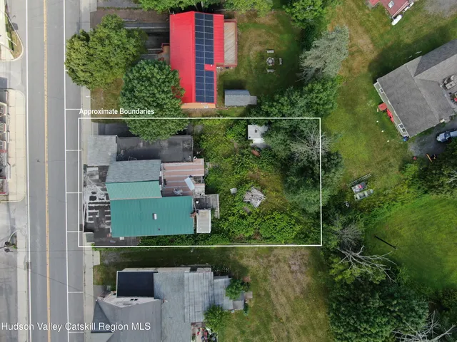 an aerial view of a city with lots of residential buildings