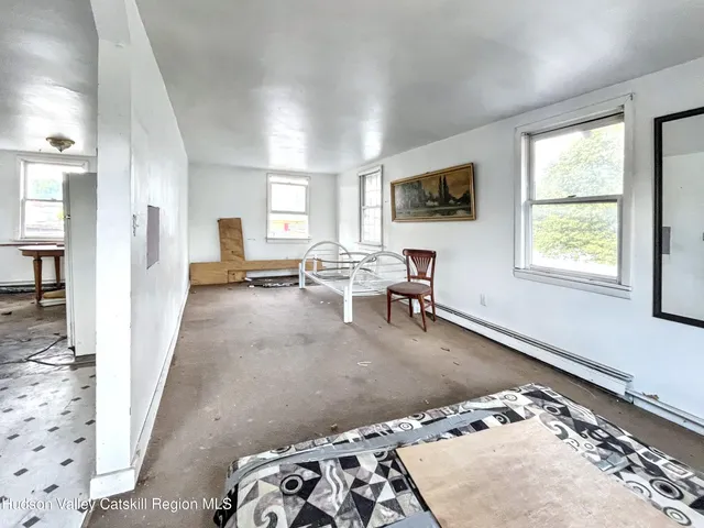 a kitchen with a sink a stove a refrigerator and cabinets
