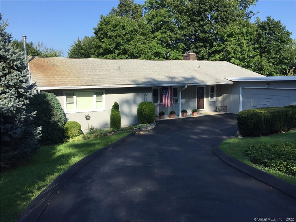 25 East Gate Road Danbury, CT 06811 - Photo 1 of 1 a front view of a house with garden