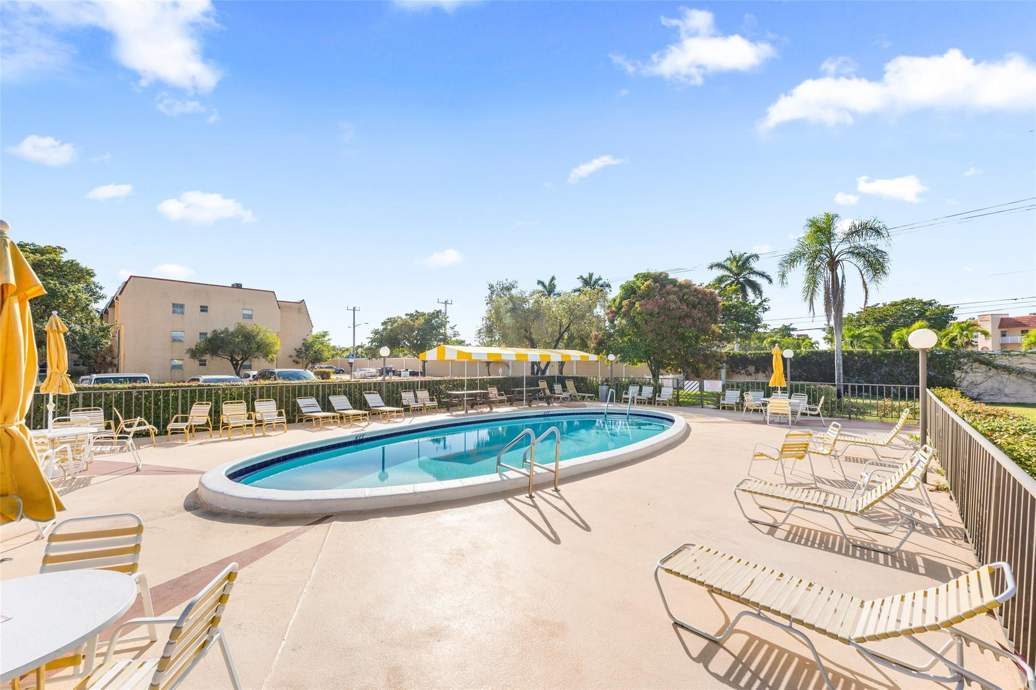 2720 North Pine Island Road, Unit 212 Sunrise, FL 33322 - Photo 15 of 46 CLOSER POOL FOR THIS SUB