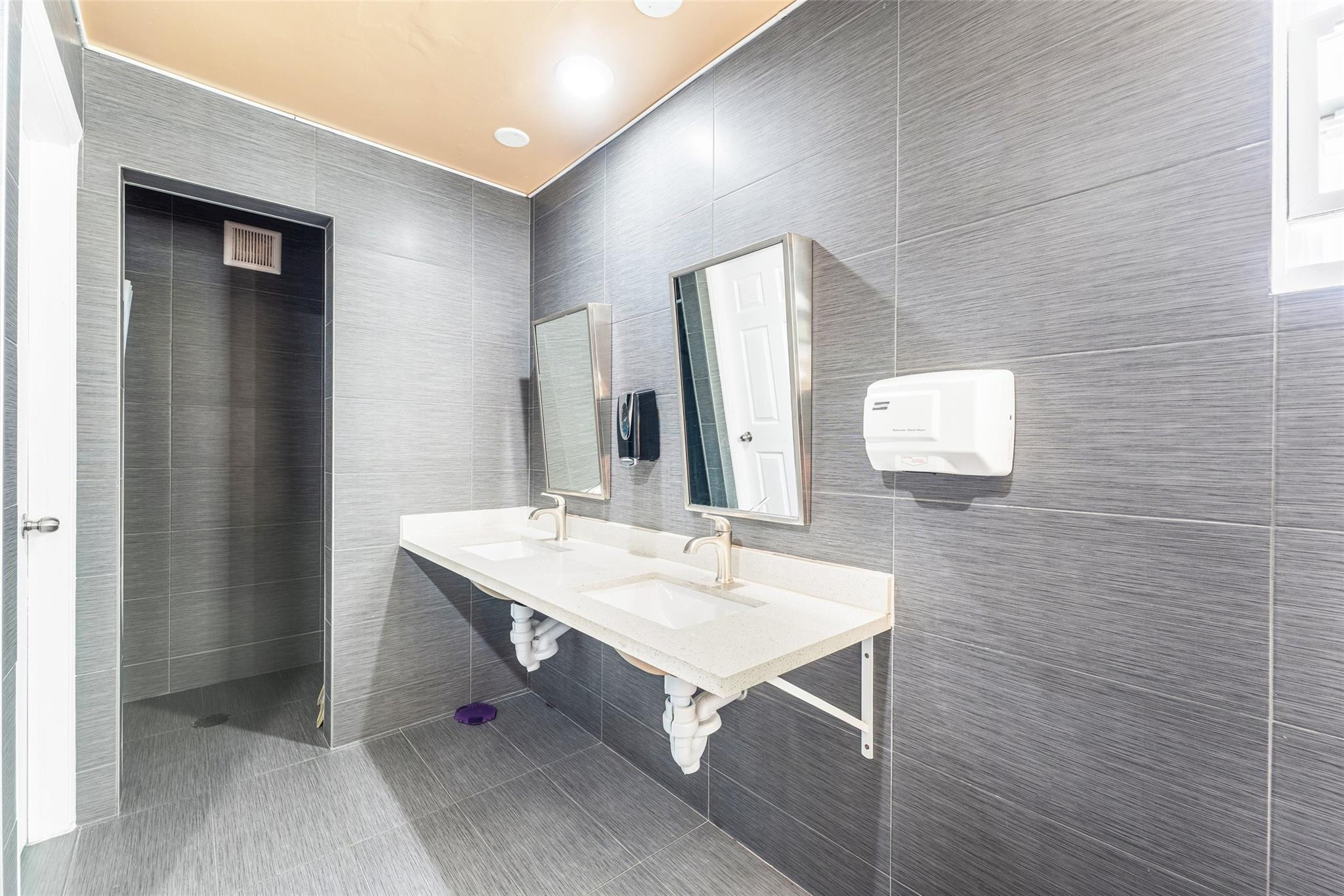 2720 North Pine Island Road, Unit 212 Sunrise, FL 33322 - Photo 16 of 46 RENOVATED CABANA BATHROOMS