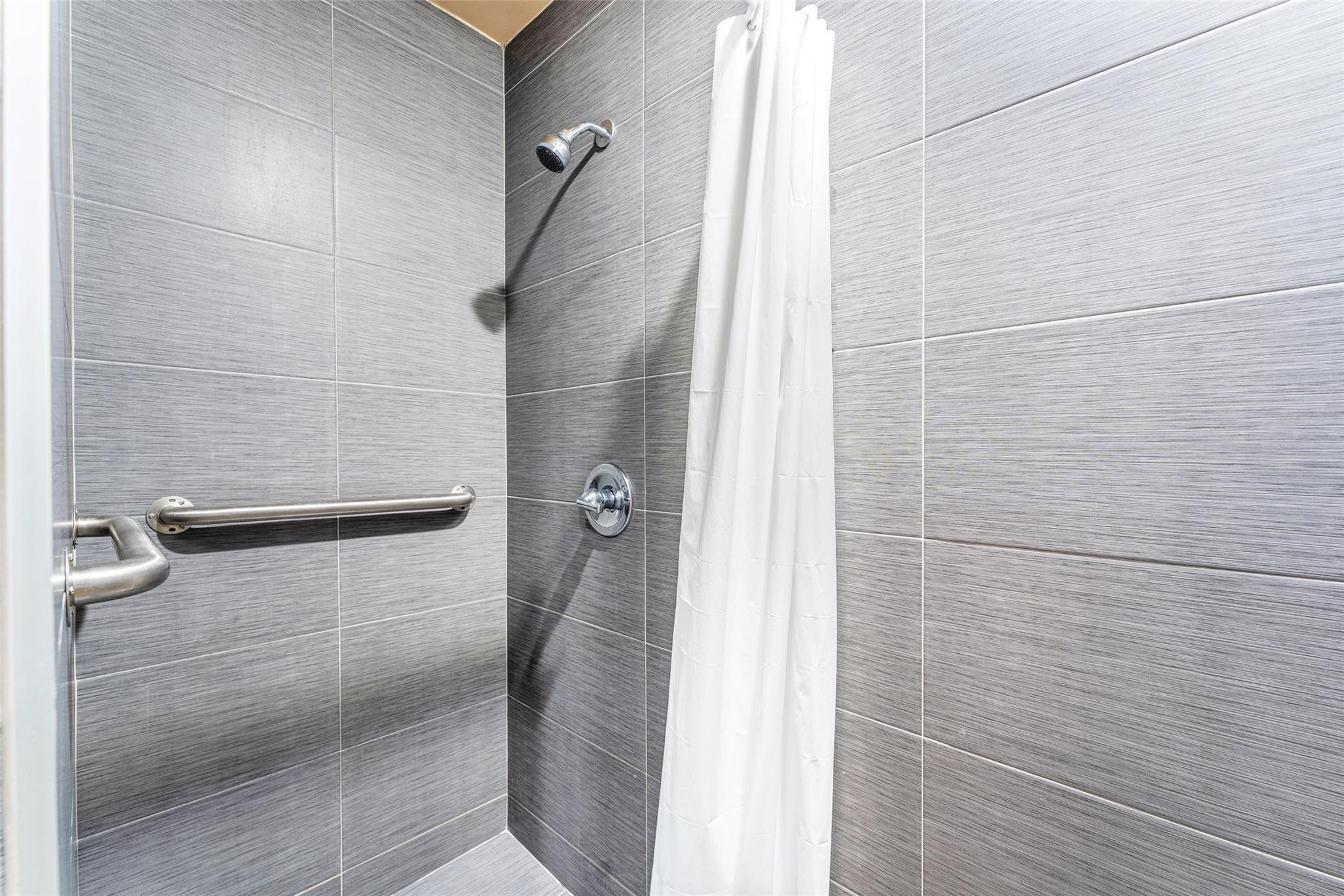 2720 North Pine Island Road, Unit 212 Sunrise, FL 33322 - Photo 17 of 46 RENOVATED CABANA BATHROOMS