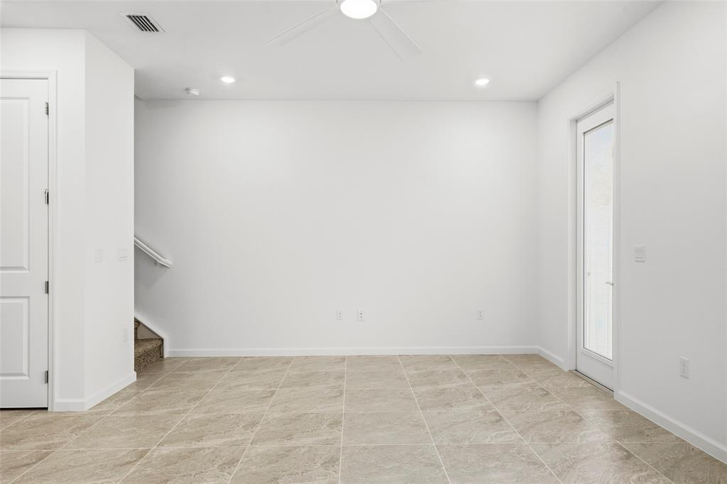 285 Southwest Sally Way Stuart, FL 34997 - Photo 11 of 48 an empty room with a natural light