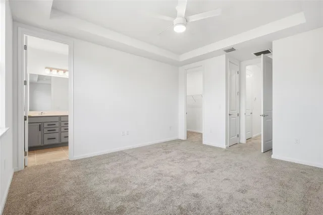 a bathroom with a double vanity sink mirror and double