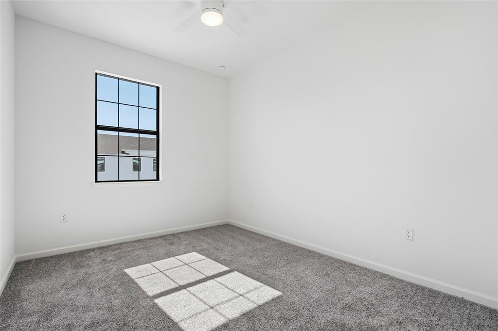 285 Southwest Sally Way Stuart, FL 34997 - Photo 18 of 48 an empty room with windows