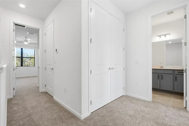 an empty room with closet area