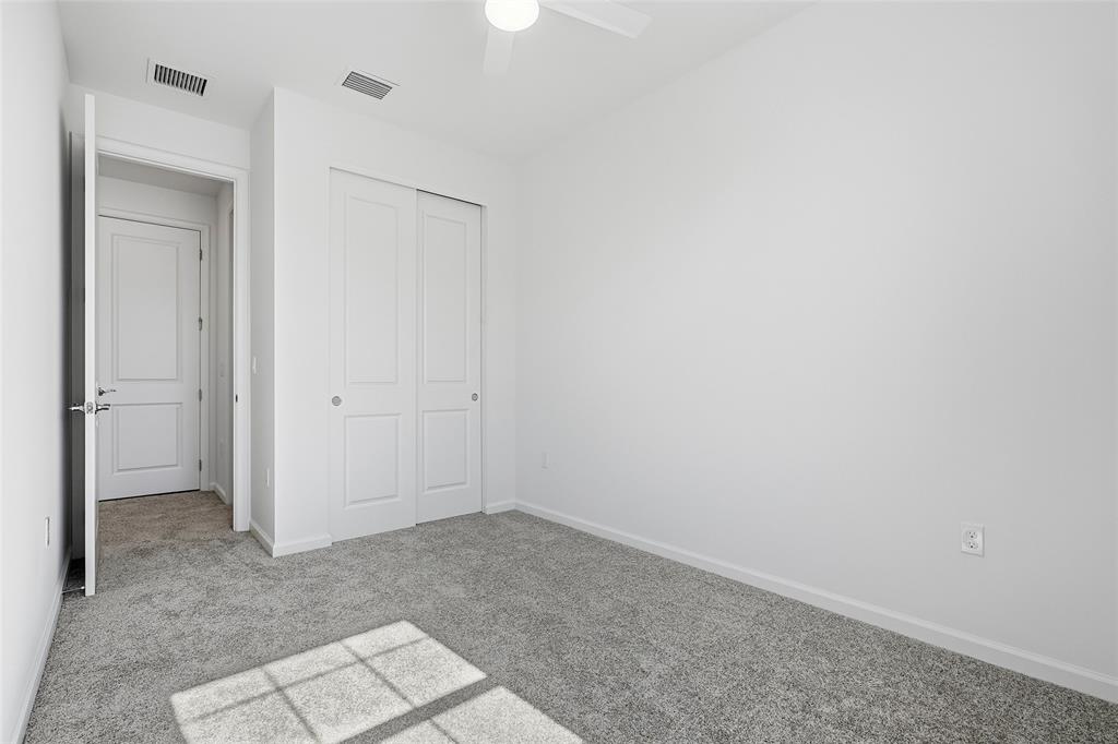 285 Southwest Sally Way Stuart, FL 34997 - Photo 22 of 48 an empty room with closet area