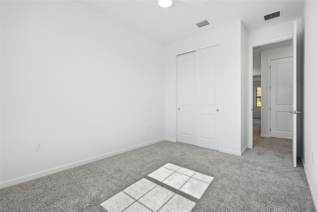 285 Southwest Sally Way Stuart, FL 34997 - Photo 24 of 48 a view of an empty room