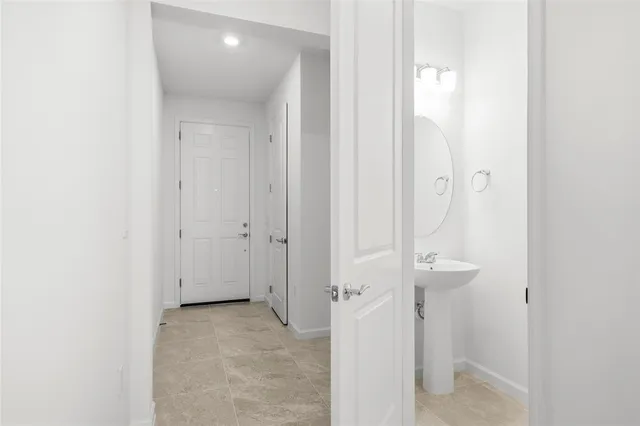 a view of storage and utility room with washer and dryer