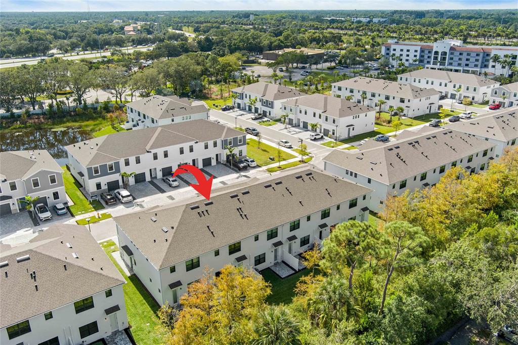 285 Southwest Sally Way Stuart, FL 34997 - Photo 37 of 48 an aerial view of a city with big lake view