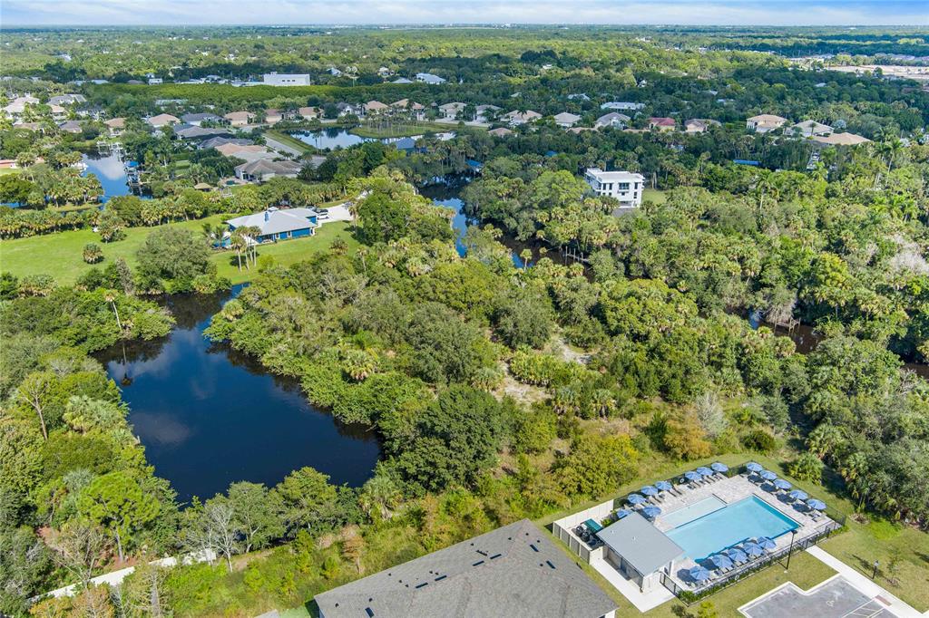 285 Southwest Sally Way Stuart, FL 34997 - Photo 39 of 48 an aerial view of a house with a yard