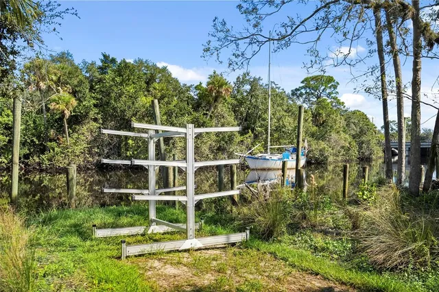 a view of a lake with a bench and lake view