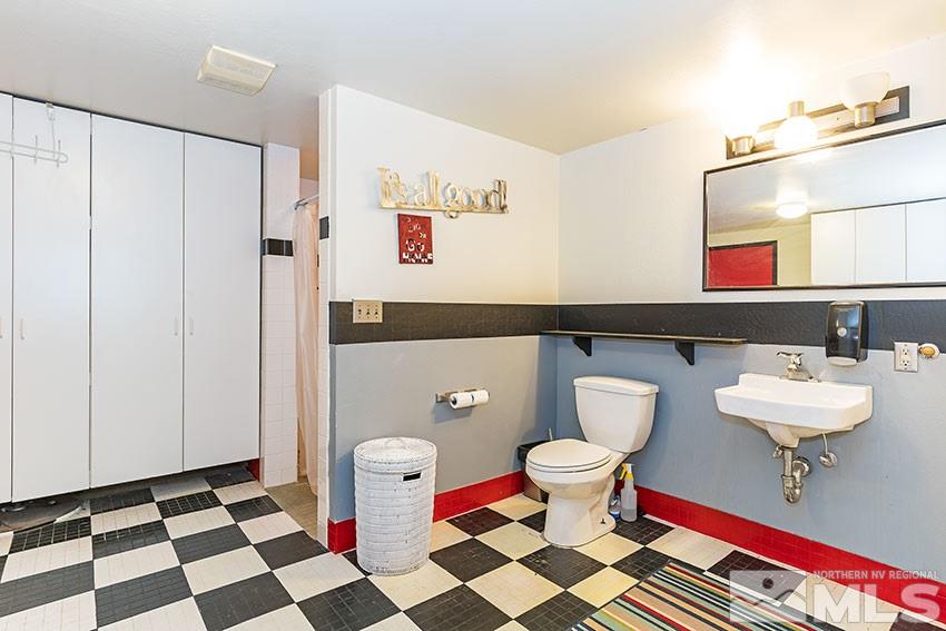 1595 Belford Road Reno, NV 89509 - Photo 15 of 21 a bathroom with a sink and a mirror