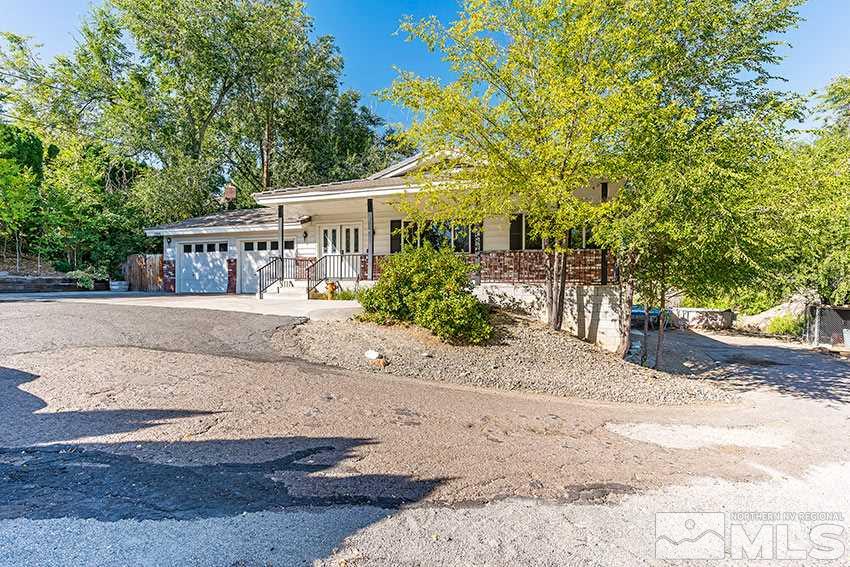 1595 Belford Road Reno, NV 89509 - Photo 18 of 21 front view of a house with a yard