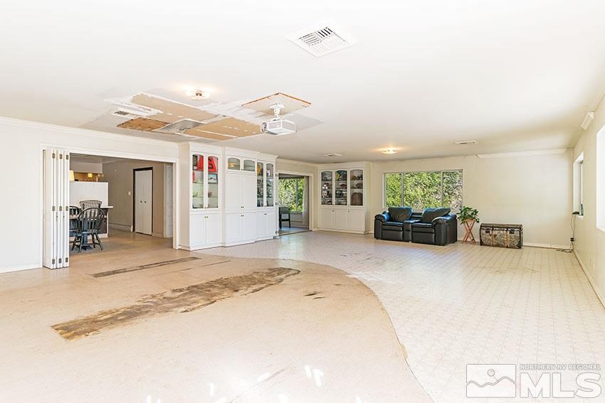 1595 Belford Road Reno, NV 89509 - Photo 2 of 21 a living room with furniture and a large window