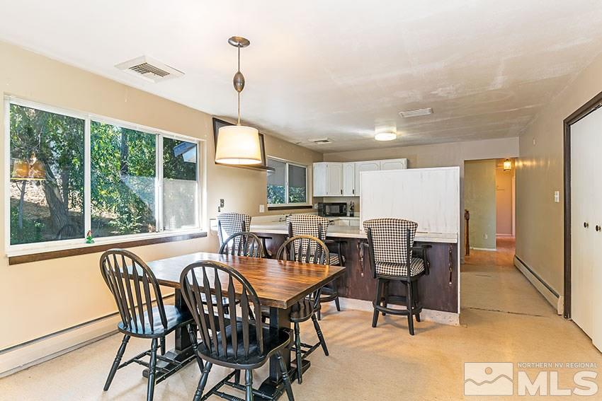 1595 Belford Road Reno, NV 89509 - Photo 6 of 21 a view of a dining room with furniture window and outside view