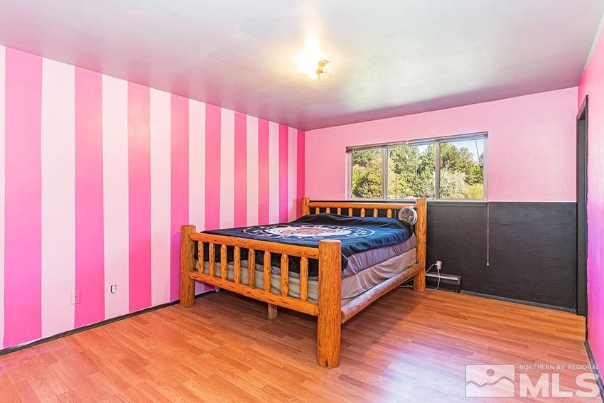 1595 Belford Road Reno, NV 89509 - Photo 9 of 21 a room with a bed and a window