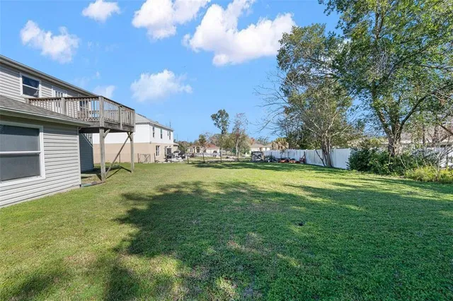 a view of house with garden