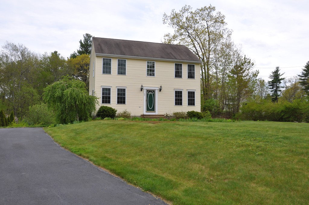 69 Haggerty Road Charlton, MA 01507 - Photo 1 of 30 a view of a house with backyard