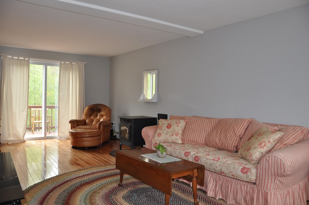 69 Haggerty Road Charlton, MA 01507 - Photo 13 of 30 a living room with furniture and a window