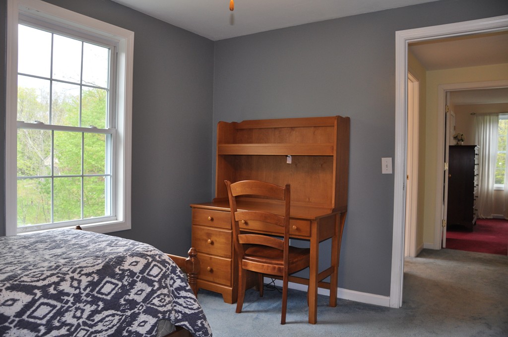 69 Haggerty Road Charlton, MA 01507 - Photo 23 of 30 a bedroom with a bed and a window