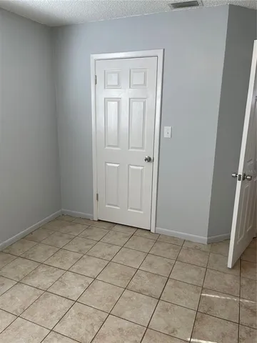 a house view with a backyard space