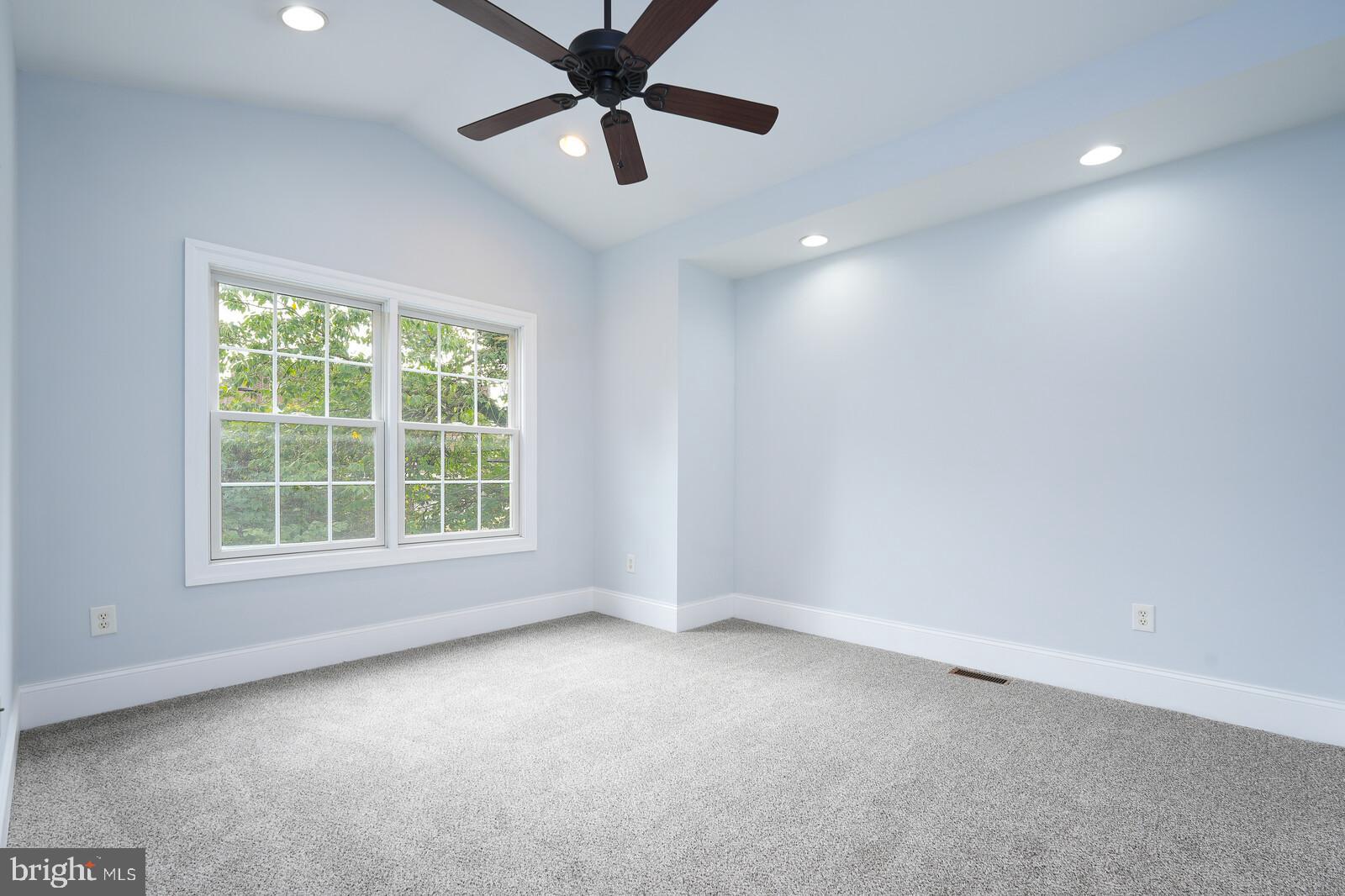 304 South Camp Meade Road Linthicum Heights, MD 21090 - Photo 21 of 43 an empty room with a window and a fan