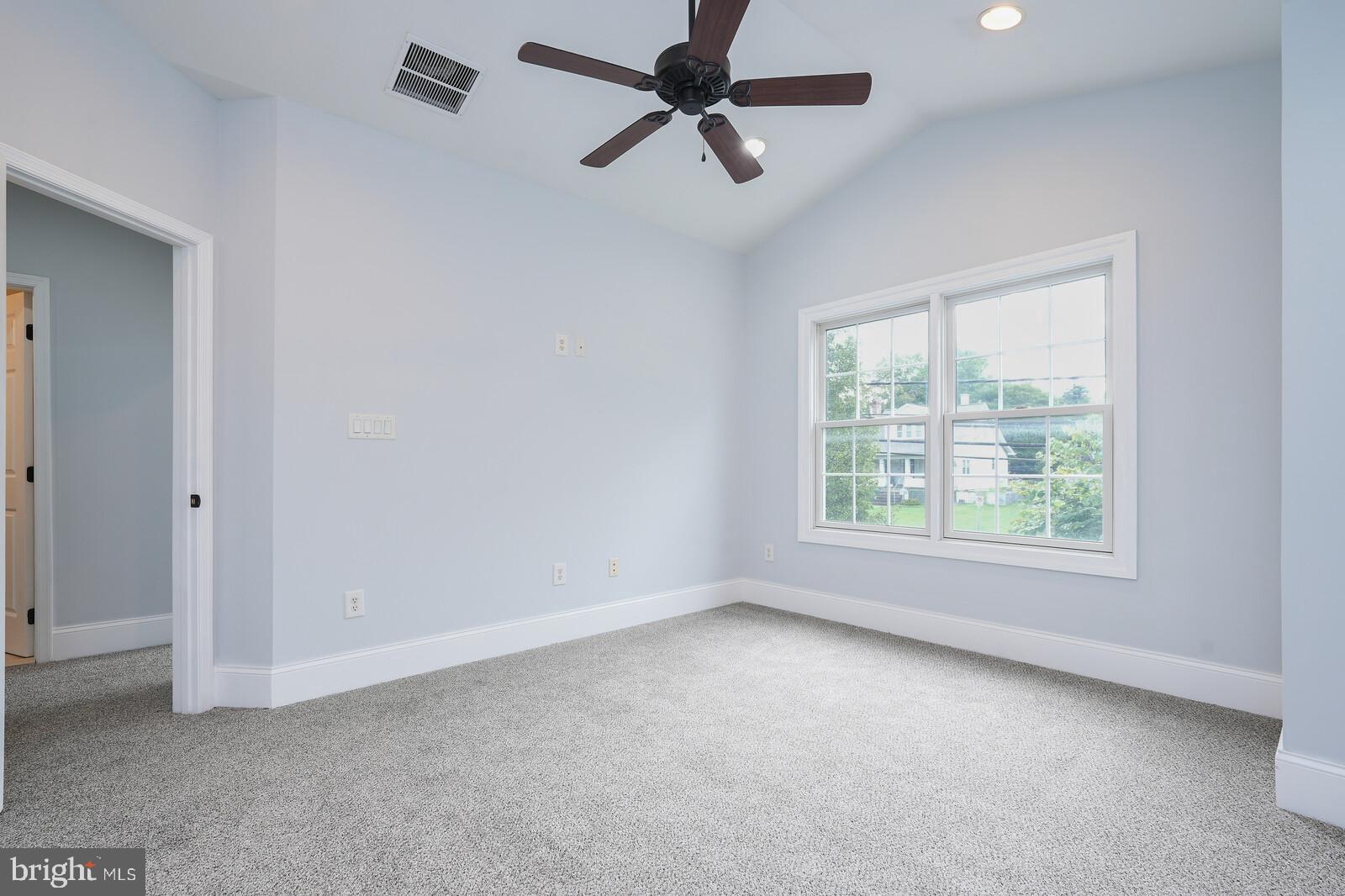 304 South Camp Meade Road Linthicum Heights, MD 21090 - Photo 22 of 43 an empty room with a window and a fan